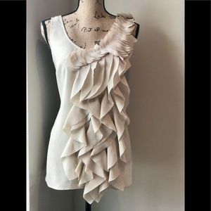 New York & Company cream fringe dressy top.